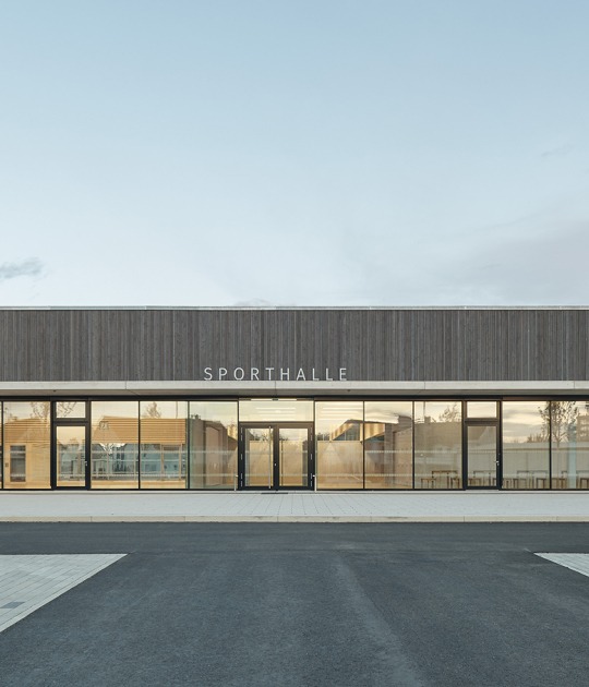Three-pitch sports hall by Drei Architekten. Photograph by Zooey Braun