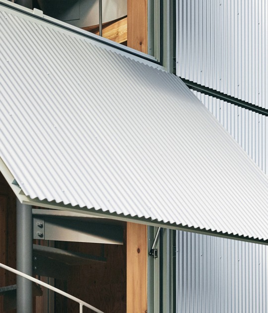 Oficina central de Uchida Shoten por Schemata Architects. Fotografía de Ju Yeon Lee.