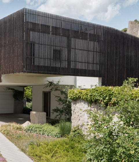 Family House Hlubocepy by RO_AR architects. Photography by Viola Hertelová