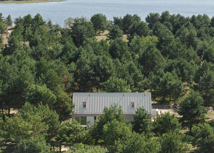 "Kownatki Lake House" complex by Archmondo. Photograph by Emi Karpowicz
