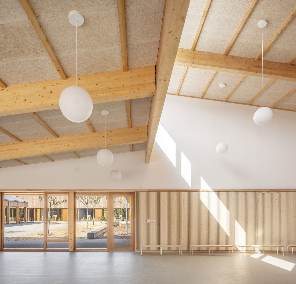 Guardería y centro de ocio Elsa Triolet por Richter architectes et associés. Fotografía por Luc Boegly.
