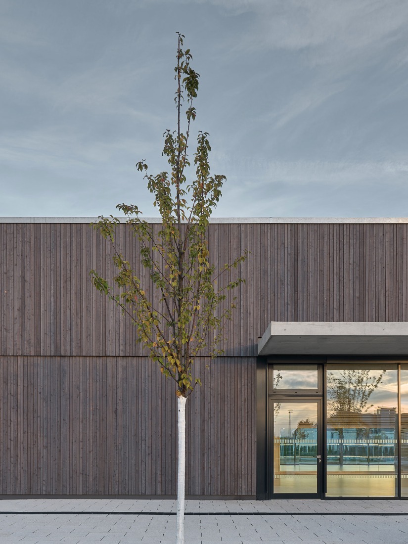 Three-pitch sports hall by Drei Architekten. Photograph by Zooey Braun.