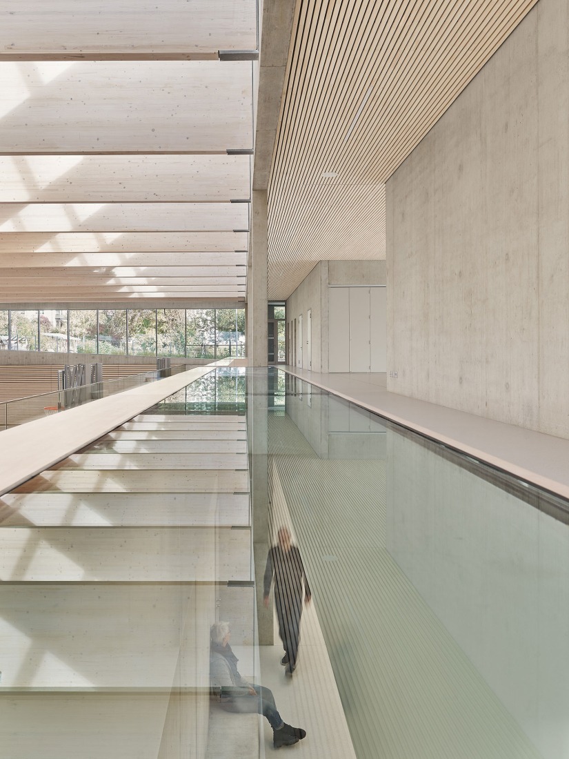Three-pitch sports hall by Drei Architekten. Photograph by Zooey Braun.