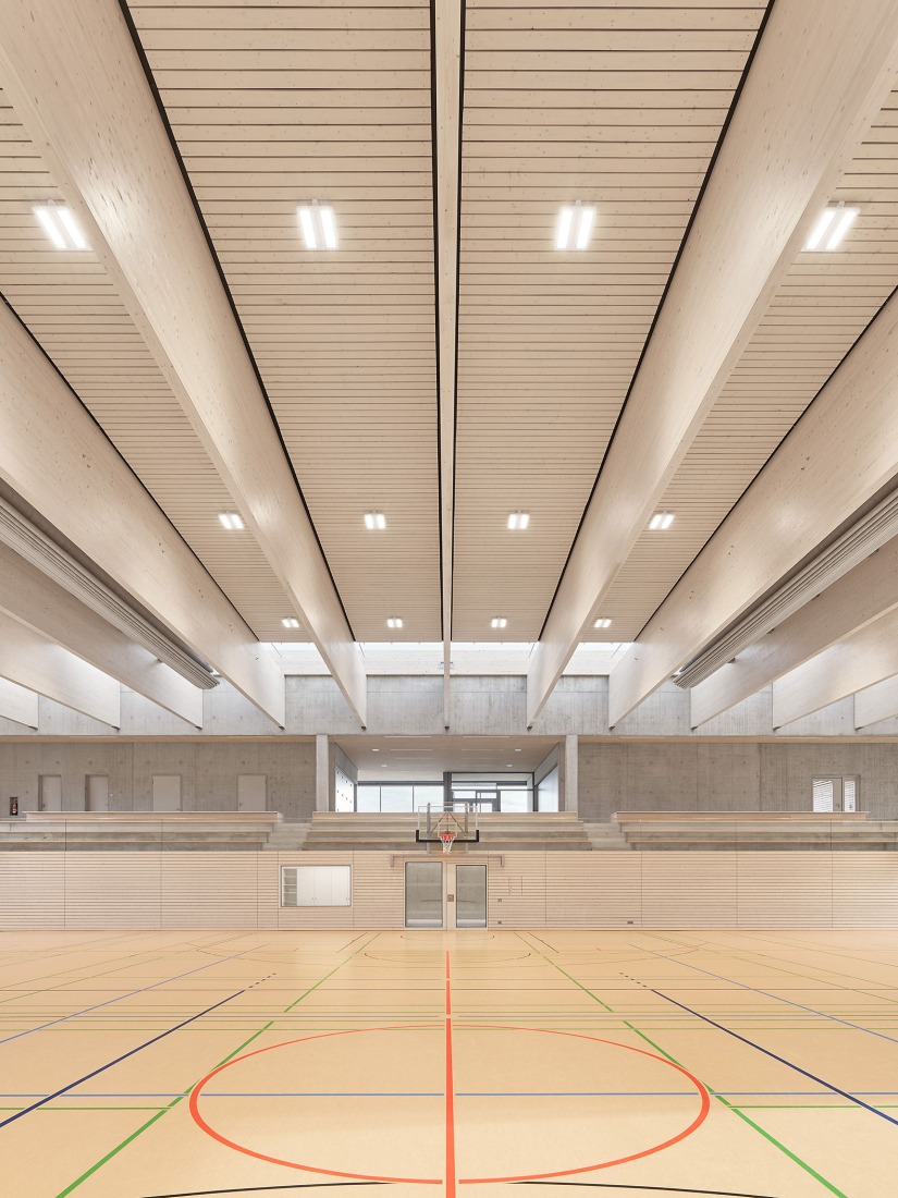 Three-pitch sports hall by Drei Architekten. Photograph by Zooey Braun.
