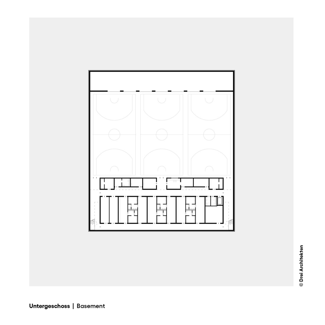 Basement floor plan. Three-pitch sports hall by Drei Architekten.