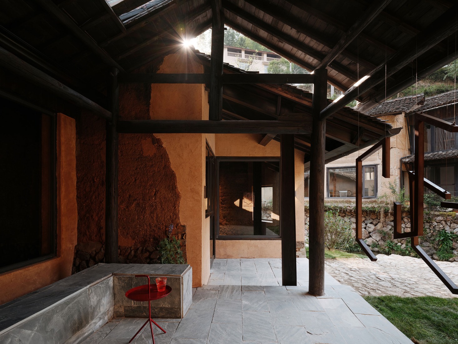 Drawing on the lifestyle of local villagers, a leisure space is set up next to the entrance. Songzhuang Z Museum by Team_BLDG. Photograph by Jonathan Leijonhufvud.