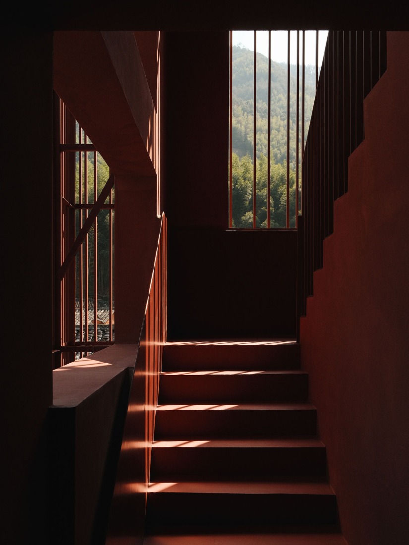 The staircase on the third floor is already a semi-outdoor space. Songzhuang Z Museum by Team_BLDG. Photograph by Jonathan Leijonhufvud.