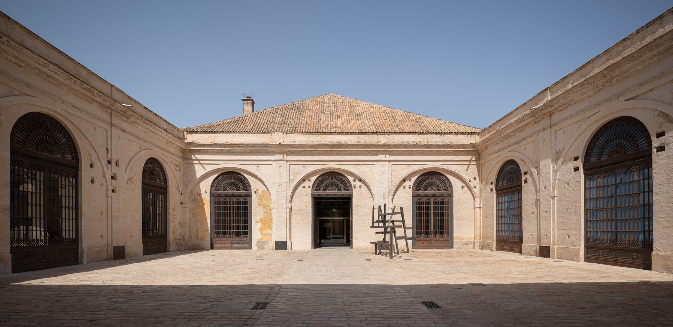"Centro Magallanes_ICC" at the Royal Artillery Factory of Seville by Reina & Asociados. Photograph by Fernando Alda.