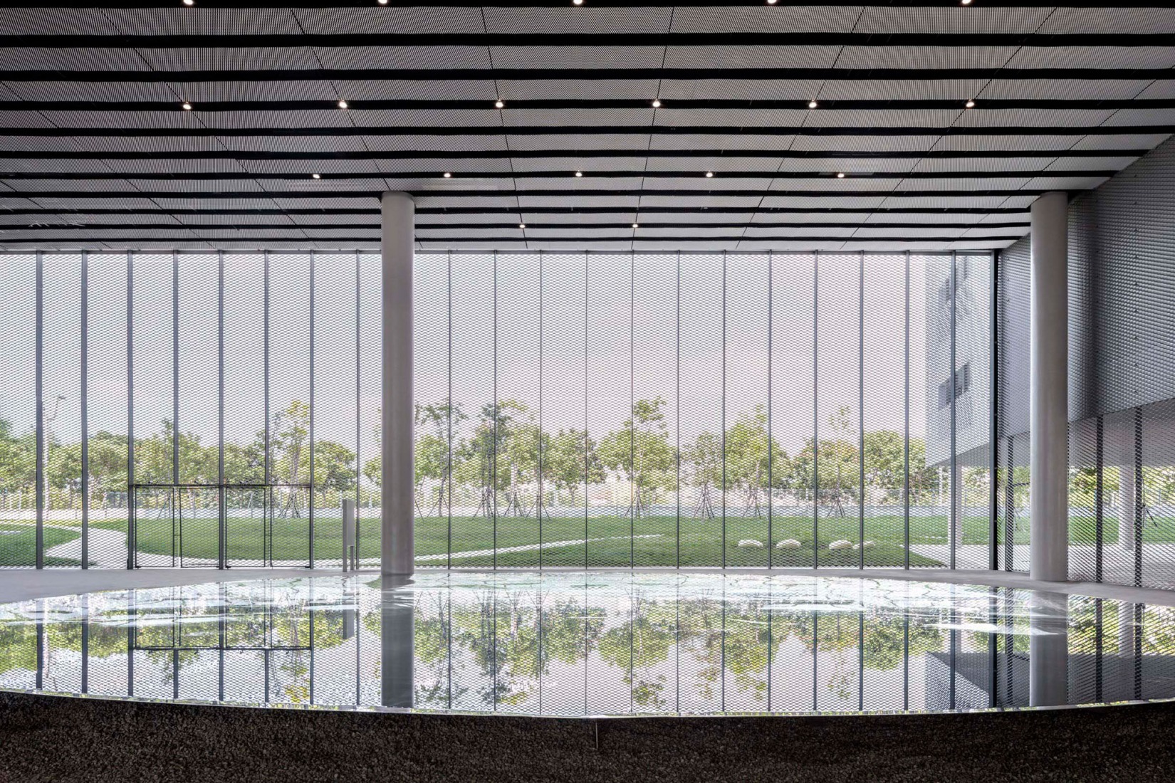 Museo-biblioteca verde de Taichung por SANAA. Fotografía por YHLAA.