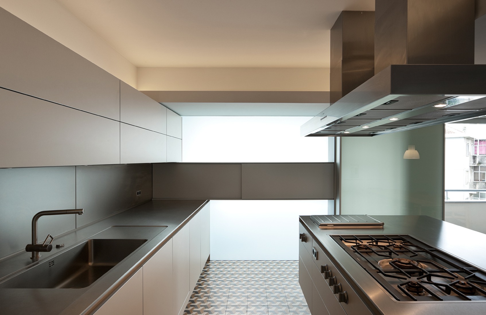 Kitchen. Renovation of an apartment in Braga by Correia/Ragazzi Arquitectos. Photography © Luis Ferreira Alves.