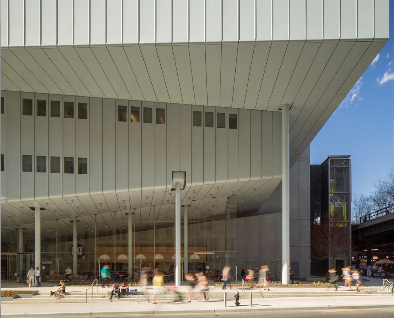 Outside view of the entrance. Gansevoort Street's facade. Whitney Museum by Renzo Piano. Photograph © Nic Lehoux.