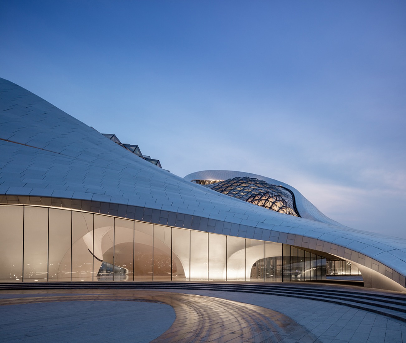 Night outside vision. Harbin Opera House by MAD Architects. Photography @ Adam Mørk.