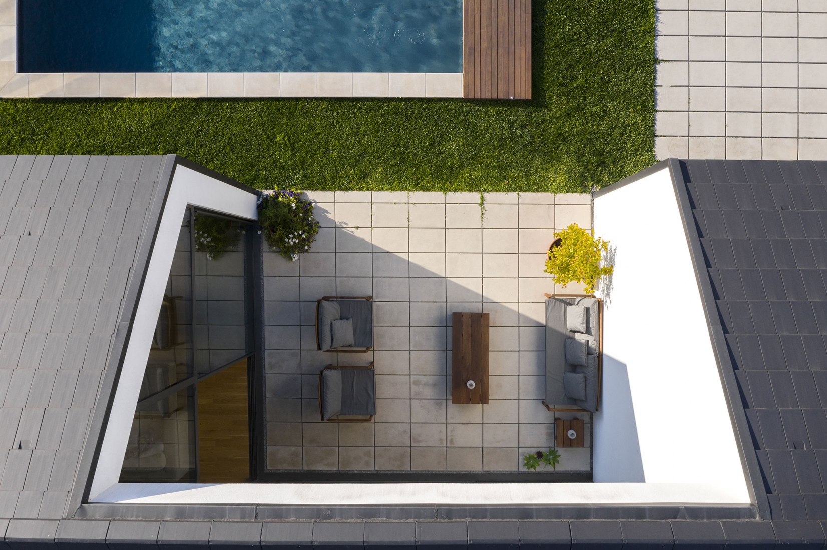 Santo Tirso House by Hous3. Photograph by Ivo Tavares Studio