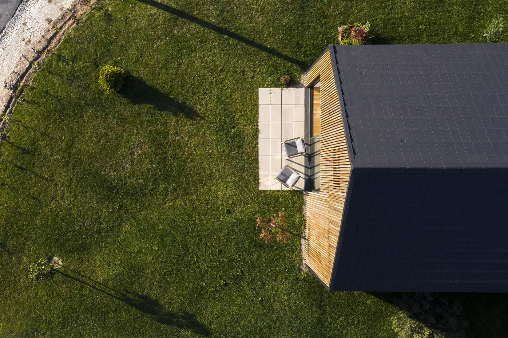 Santo Tirso House by Hous3. Photograph by Ivo Tavares Studio