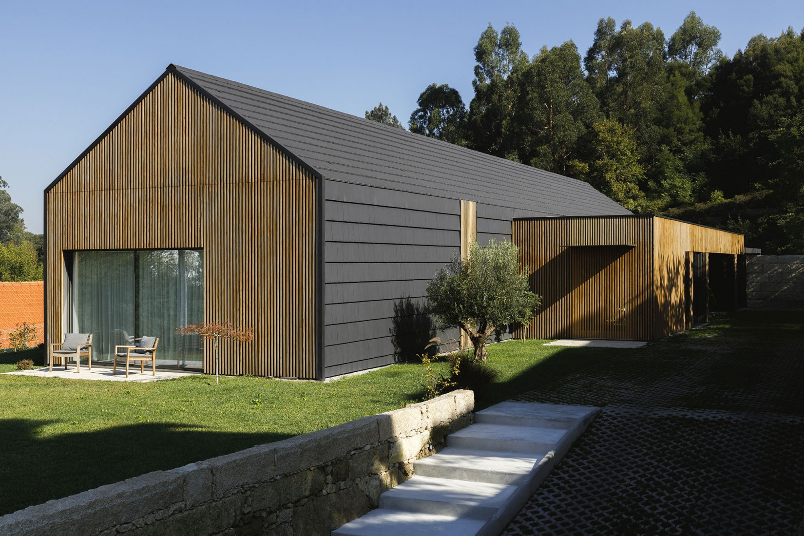Santo Tirso House by Hous3. Photograph by Ivo Tavares Studio