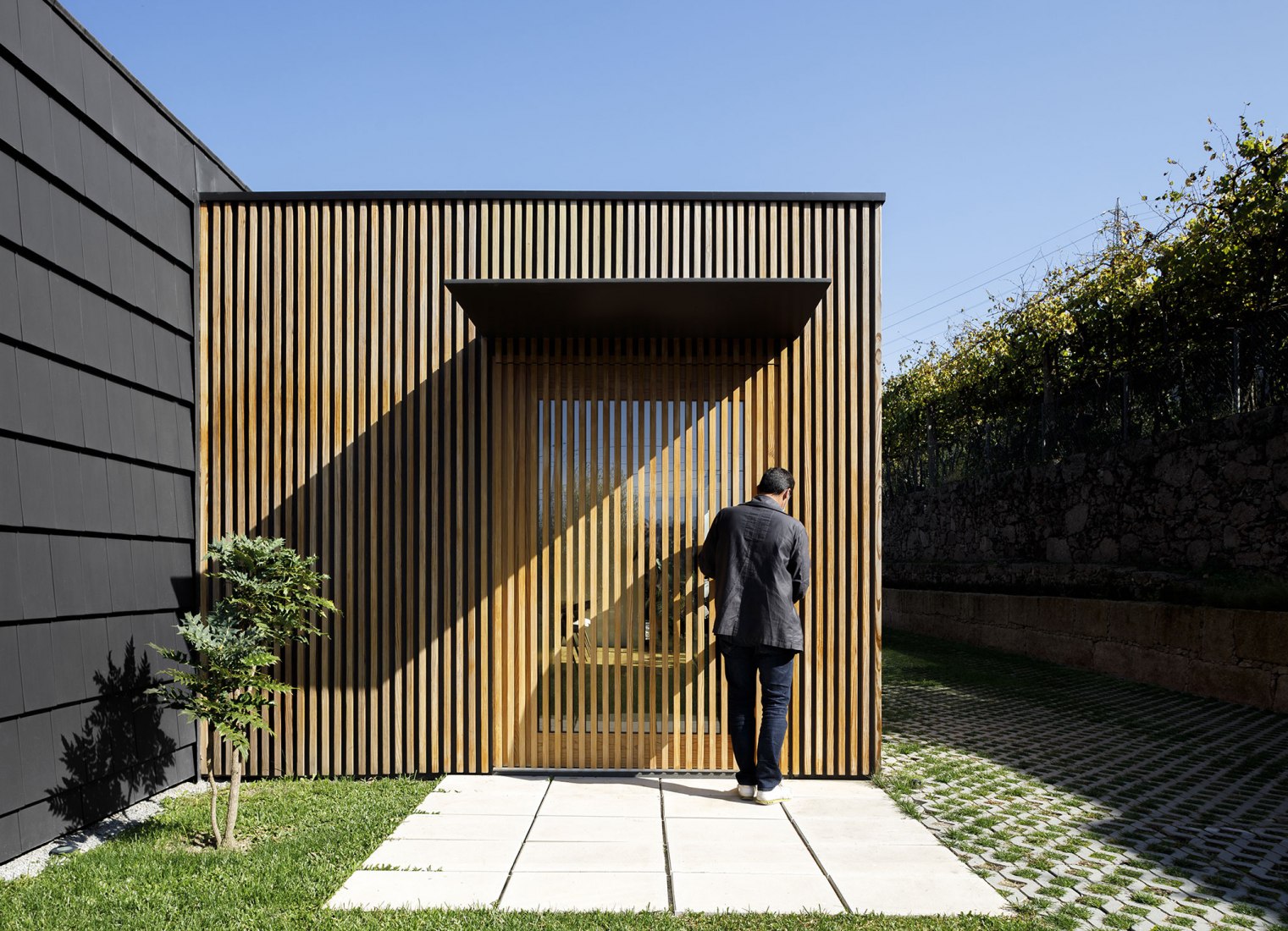 Santo Tirso House by Hous3. Photograph by Ivo Tavares Studio