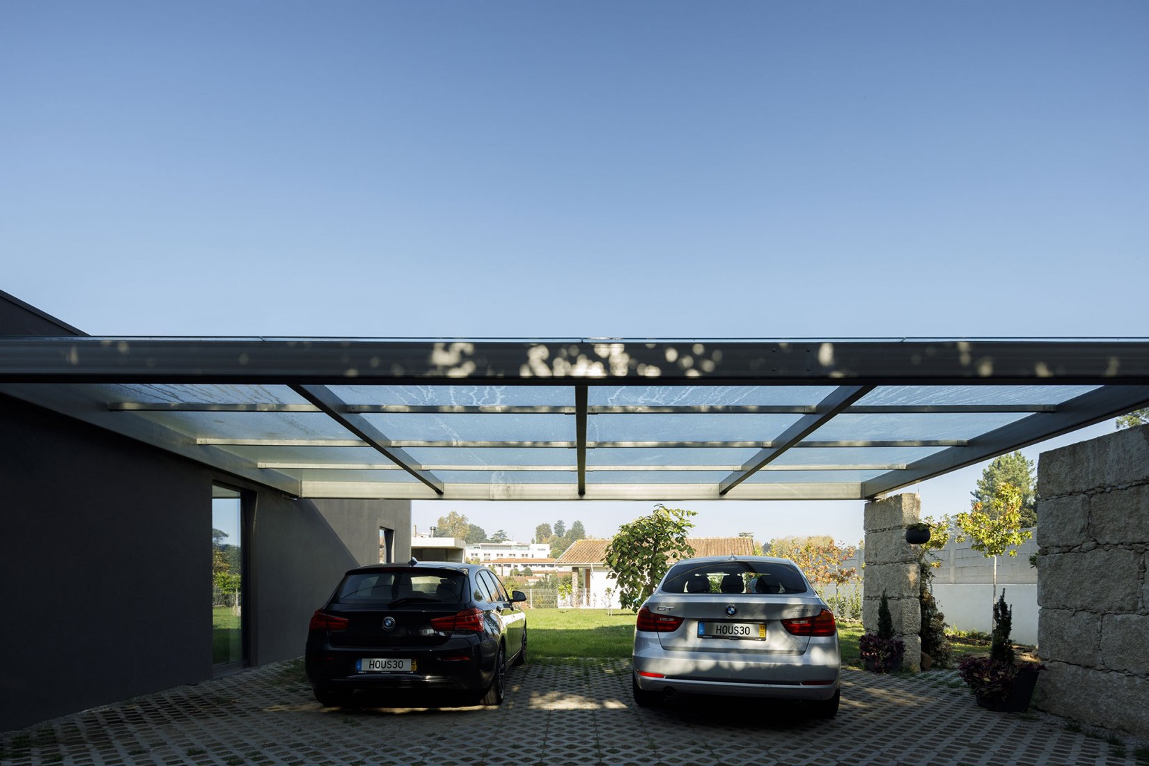 Santo Tirso House by Hous3. Photograph by Ivo Tavares Studio