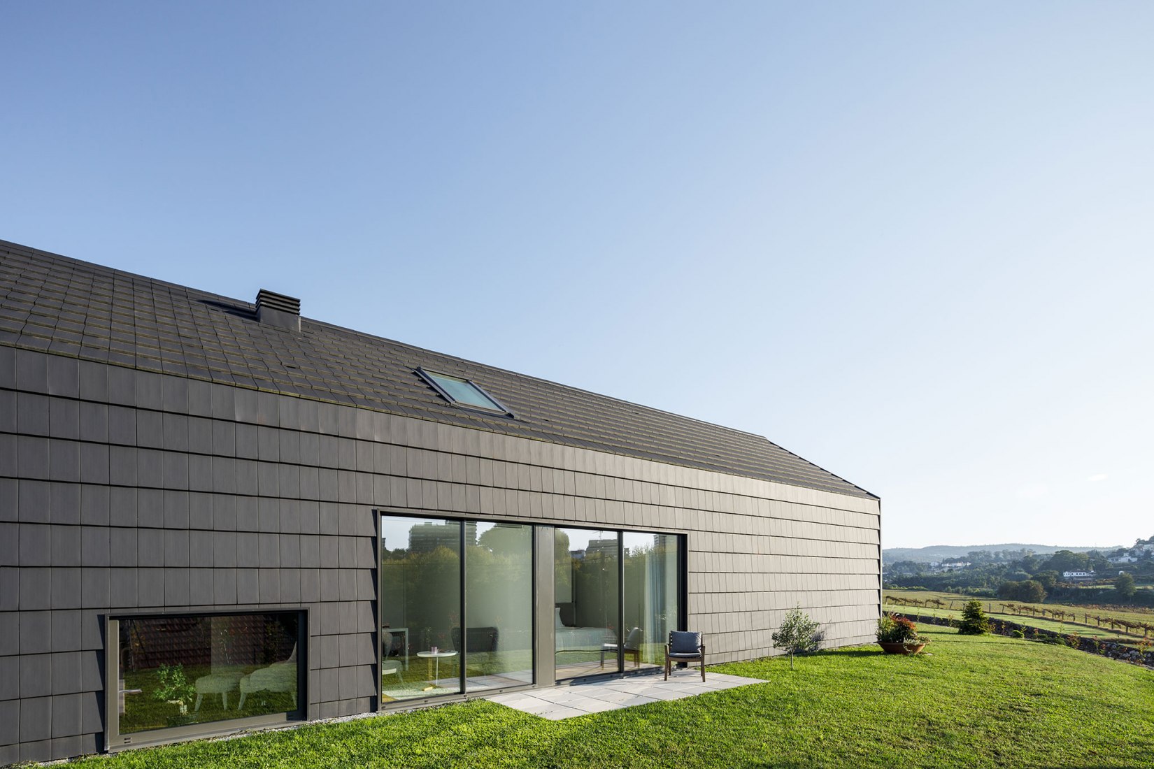 Santo Tirso House by Hous3. Photograph by Ivo Tavares Studio