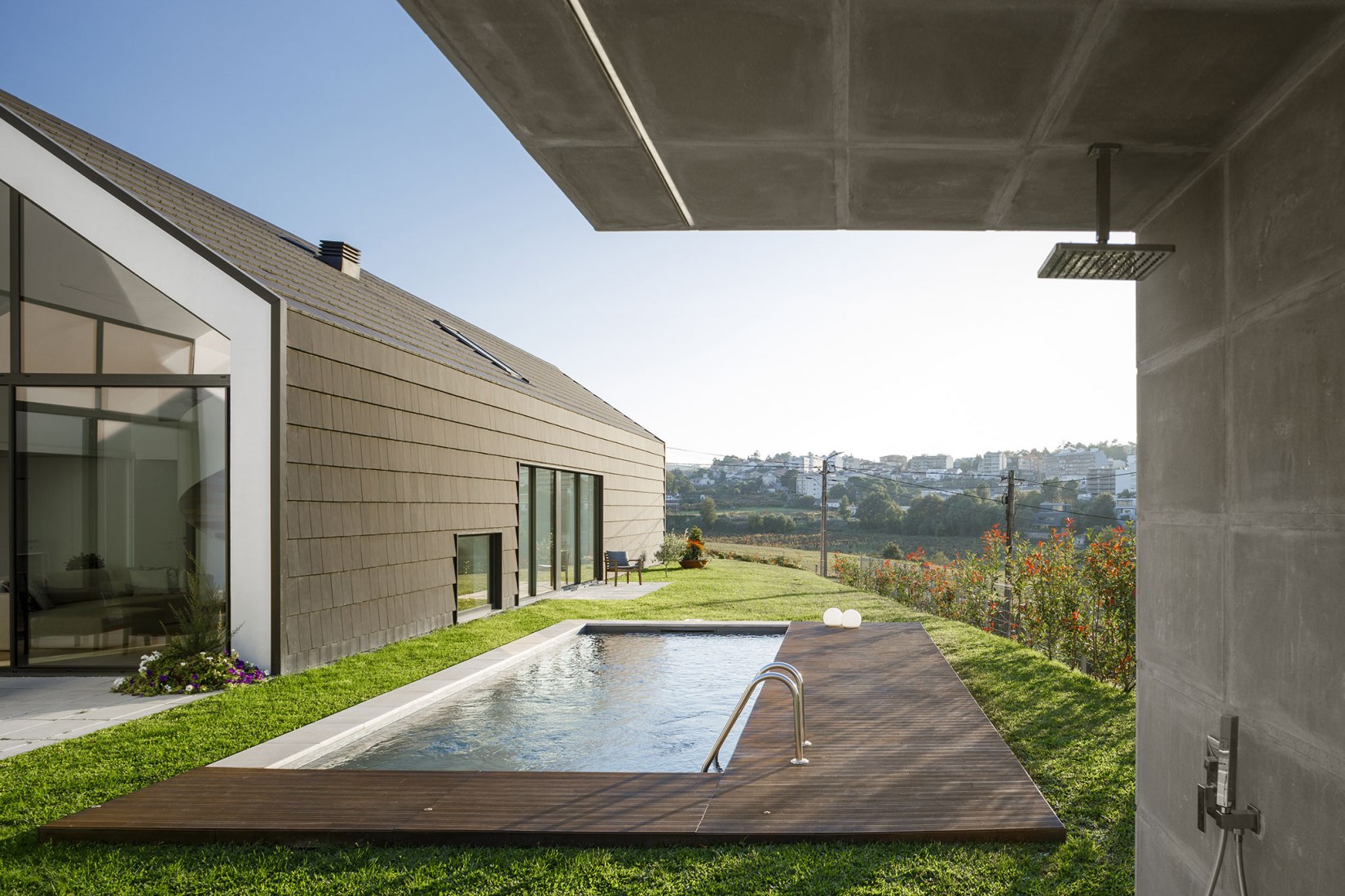 Santo Tirso House by Hous3. Photograph by Ivo Tavares Studio