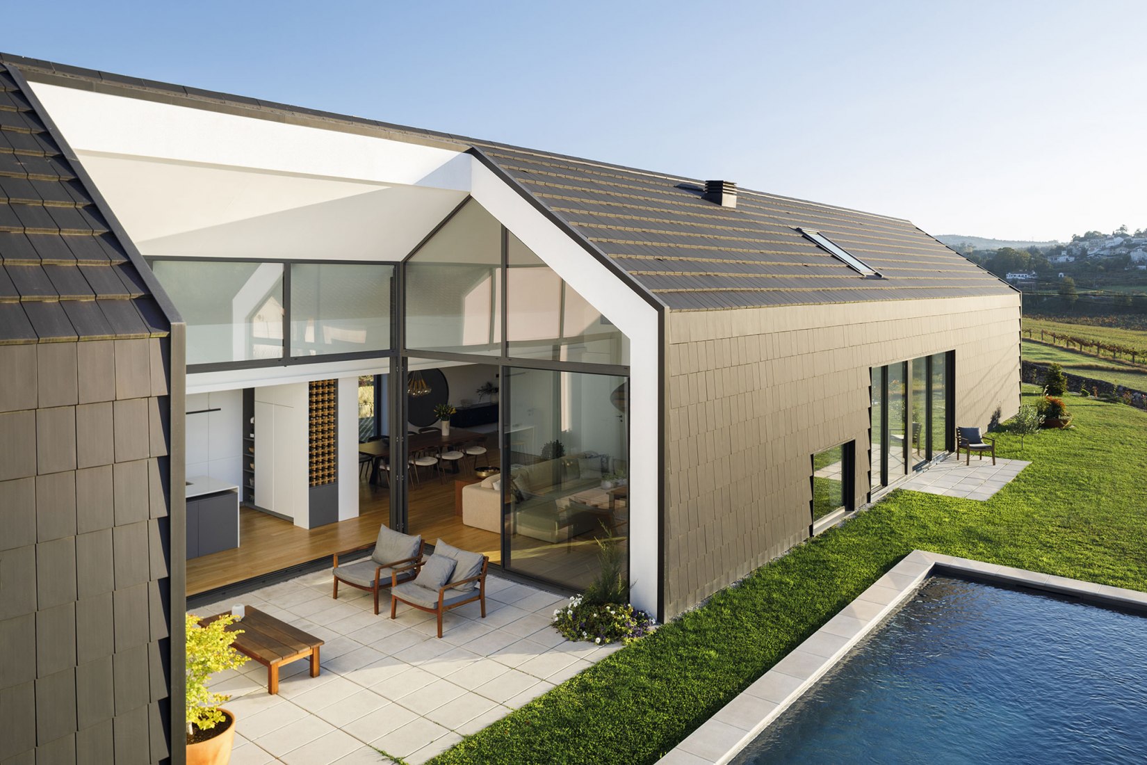 Santo Tirso House by Hous3. Photograph by Ivo Tavares Studio