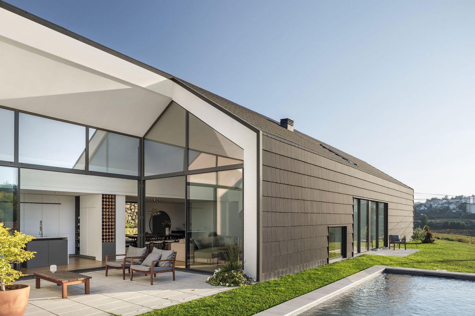 Santo Tirso House by Hous3. Photograph by Ivo Tavares Studio