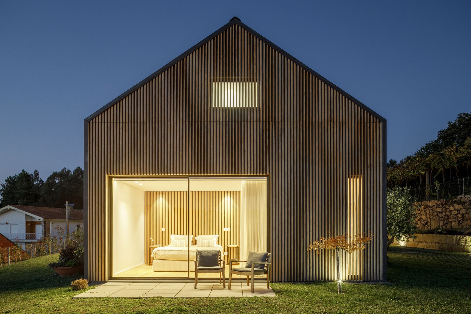 Santo Tirso House by Hous3. Photograph by Ivo Tavares Studio