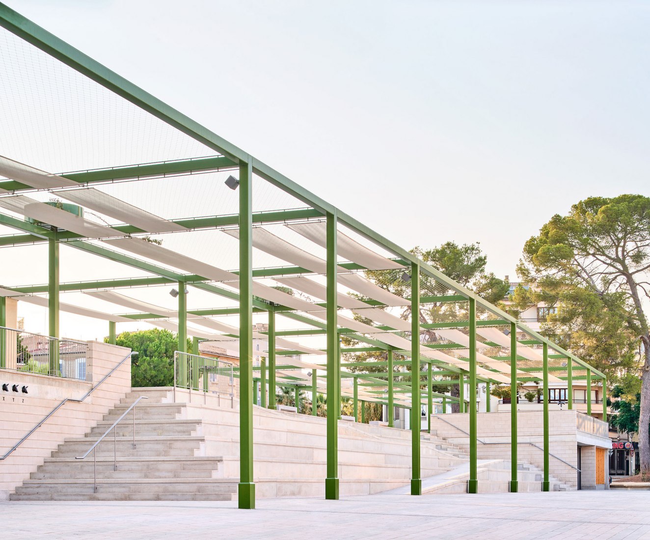Steps, pergola, civic room. Fonamental. Renovation of Plaza Mallorca by Son Estudi. Photography by Jose Hevia 