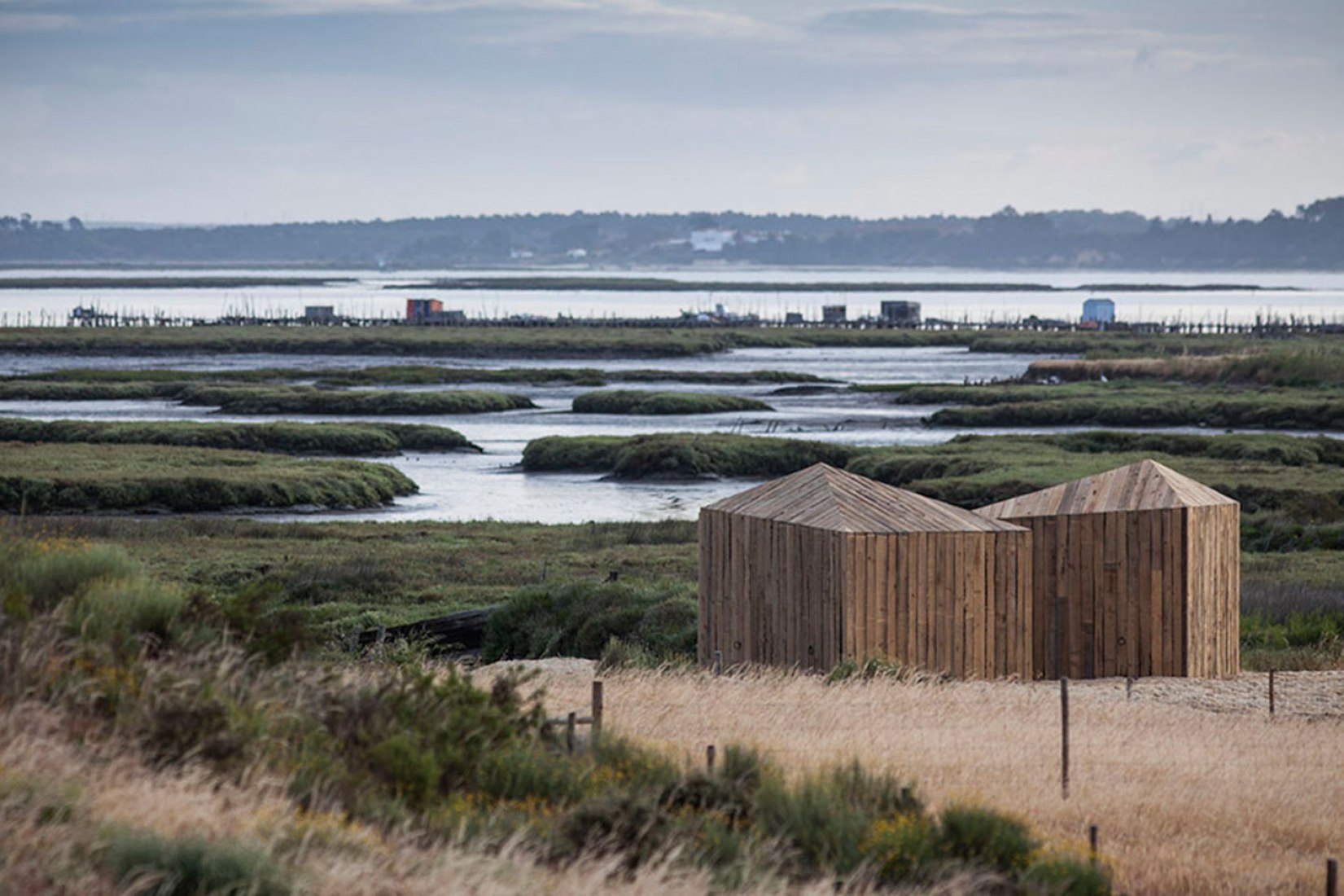 View of the river. Cabanas no Rio. Aires Mateus. Photography © Nelson Garrido. 