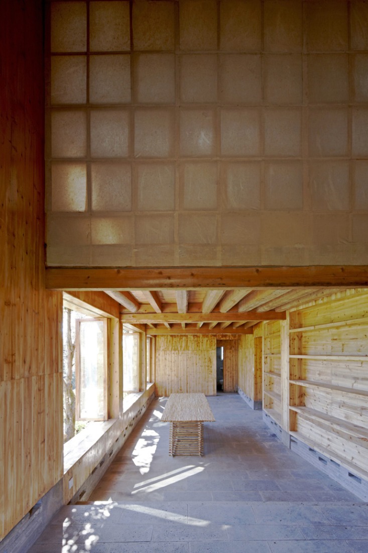 Interior view of the finished paper and wood and bamboo walls. Photography © Shu He.