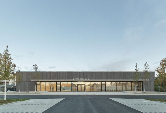 Three-pitch sports hall by Drei Architekten. Photograph by Zooey Braun.