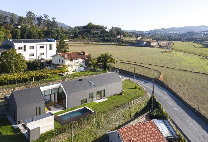 Santo Tirso House by Hous3. Photograph by Ivo Tavares Studio