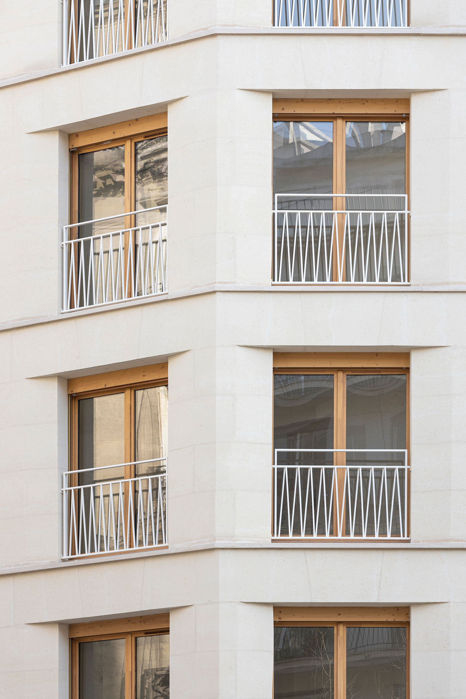 15 housing units in solid stone, timber and hemp concrete by MAO Architectes. Photograph by Cyrille Lallement