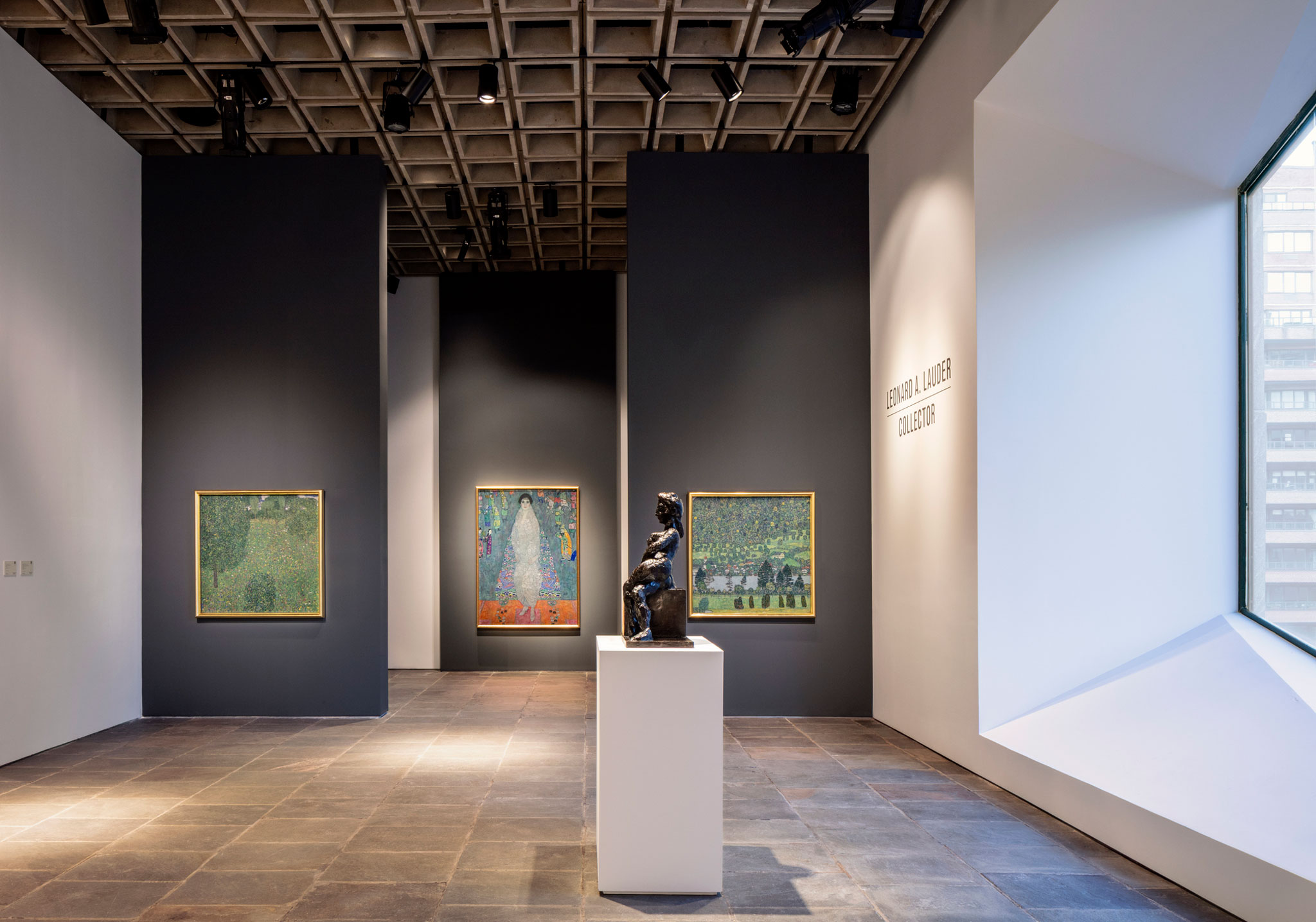 Sotheby’s fourth-floor Breuer galleries, featuring Gustav Klimt’s Blooming Meadow (Blumenwiese), Portrait of Elisabeth Lederer (Bildnis Elisabeth Lederer) and Waldabhang bei Unterach am Attersee (Forest Slope in Unterach on the Attersee), from The Leonard A. Lauder Collection [left to right]. Photography by Stefan Ruiz Courtesy of Sotheby’s.