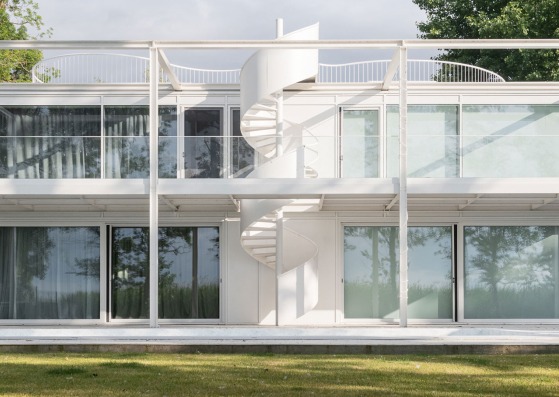 Twin Holiday Home by építész stúdió. Photography by Norbert Juhász