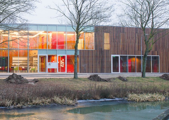 Neighbourhood lounge from roerdompstraat. Huis van Droo Community Centre by JDWA