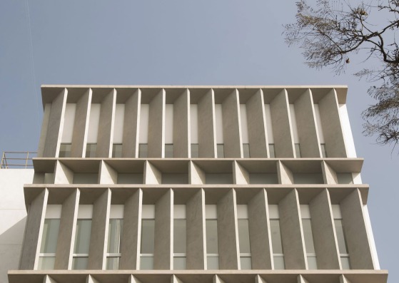 Concrete trellis. Atenea Building. Photograph by K+M Arquitectos y Urbanismo