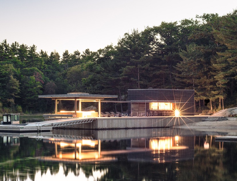View at dusk. Boat House by Weiss Architecture. Photography © Arnaud Marthouret