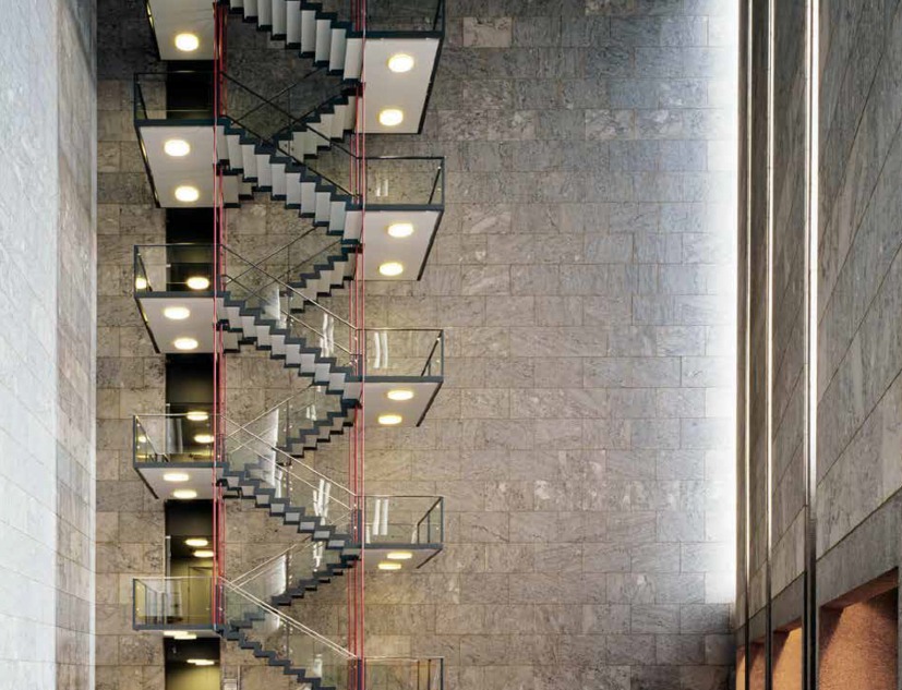 Staircase of the National Bank of Denmark, designed by Arne Jacobsen, in the middle of Copenhagen, between 1966 and 1978. Image courtesy of National Bank of Denmark