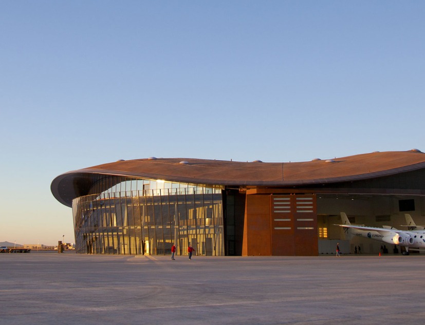 WhiteKnightTwo carrier aircraft, VMS Eve and SpaceShipTwo towed out of hangar at Spaceport America. Image courtesy of VirginGalactic