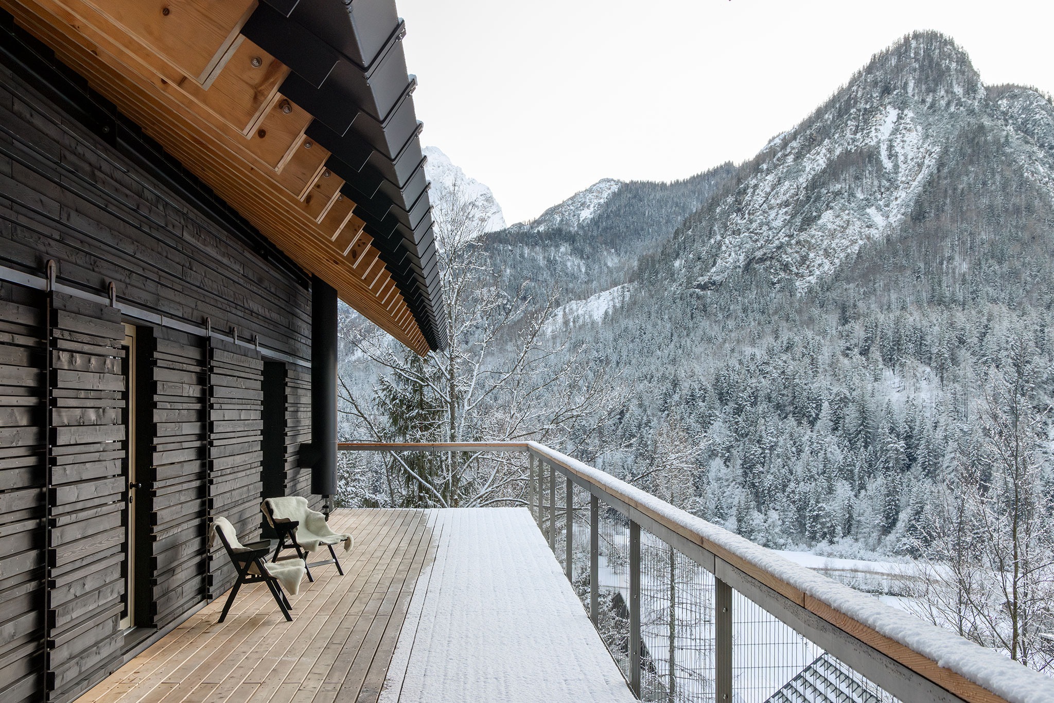 Twin Alpine Houses by Dekleva Gregoric Architects. Photography by Ana Skobe.