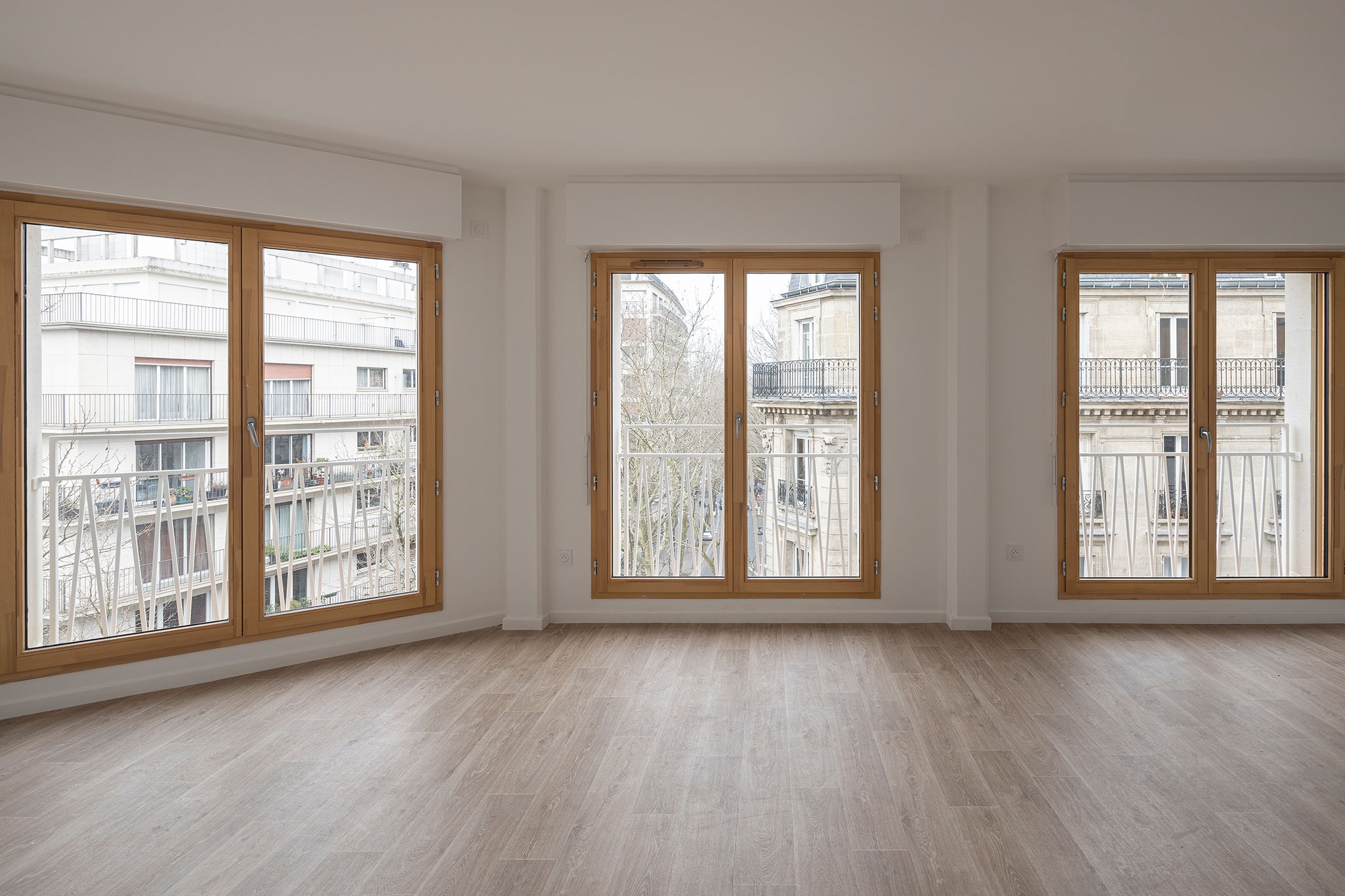 15 housing units in solid stone, timber and hemp concrete by MAO Architectes. Photograph by Cyrille Lallement. 15 housing units in solid stone, timber and hemp concrete by MAO Architectes. Photograph by Cyrille Lallement.