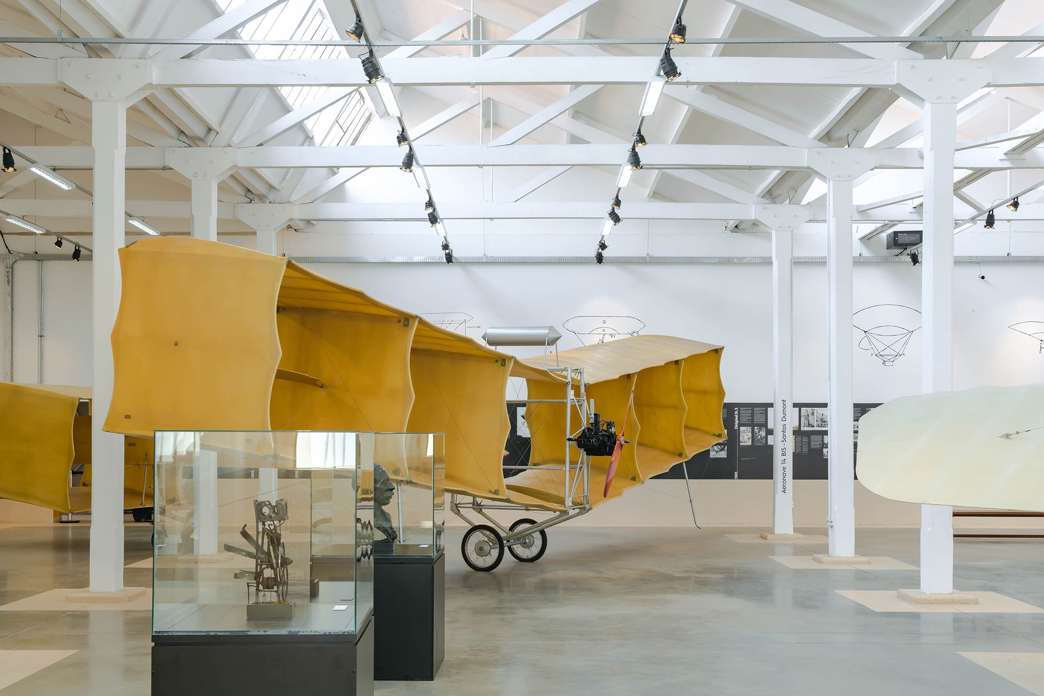 Interior view of the Exhibition Building M, featuring artworks from the collection of the Santos Dumont Foundation. Fábrica de Arte Marcos Amaro (FAMA) by KAAN. Photograph by Sebastian van Damme. Interior view of the Exhibition Building M, featuring artworks from the collection of the Santos Dumont Foundation. Fábrica de Arte Marcos Amaro (FAMA) by KAAN. Photograph by Sebastian van Damme.