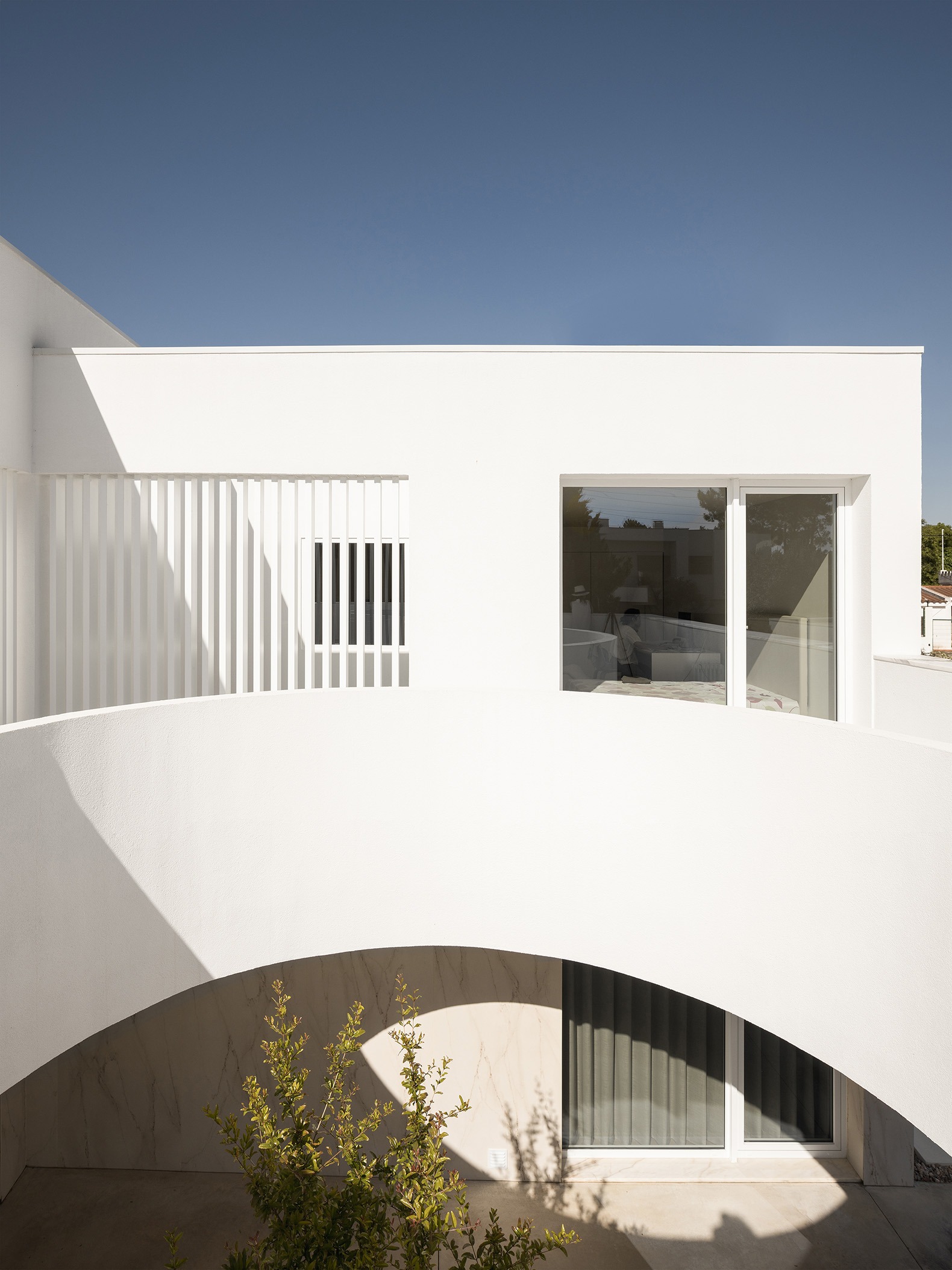 Verdizela House by Estúdio AMATAM. Photograph by Garcês.