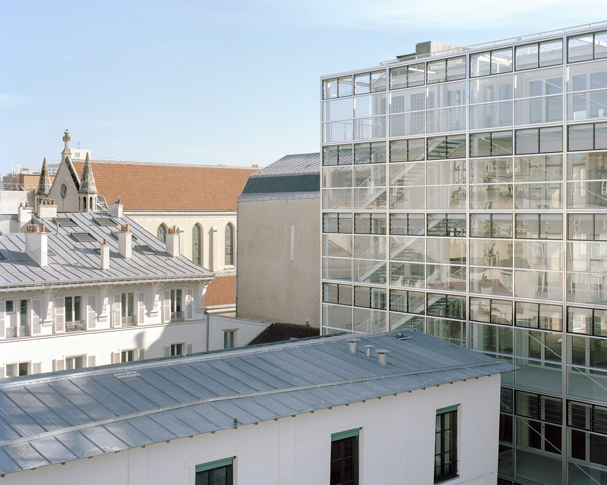206 Lafayette - Restructuring and Densification of a Mixed-Use Block Including Offices, Social Housing and Stores by DATA architectes + THINK TANK architecture. Photograph by Maxime Delvaux.