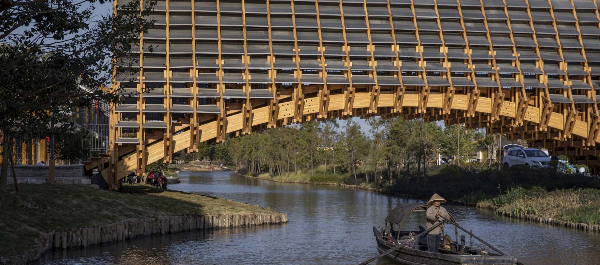 Reinterpreting the Chinese tradition in wood. Timber Bridge by LUO ...