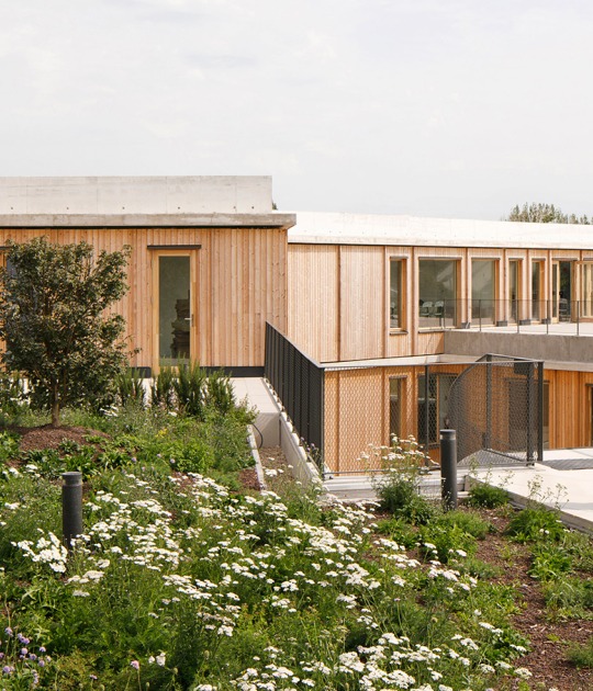 House of the French canoeing, kayak and paddle sports federation by Le Studio Sanna Baldé. Photograph by Clément Guillaume