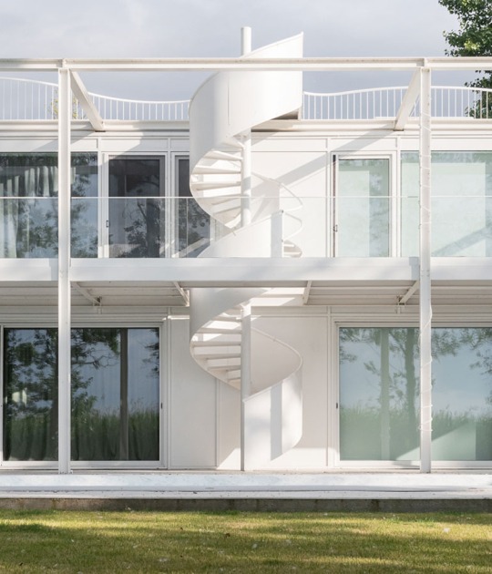 Twin Holiday Home by építész stúdió. Photography by Norbert Juhász