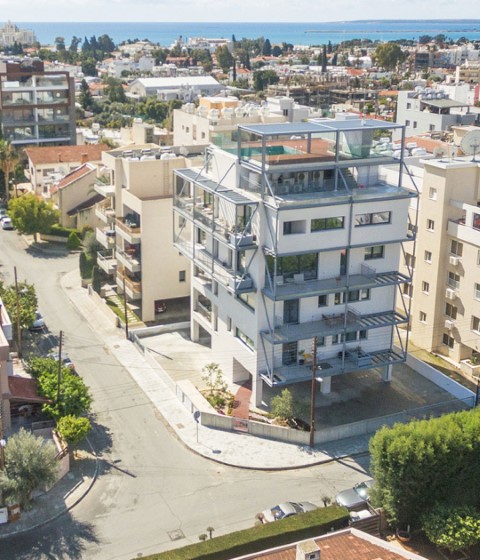 Bloque de apartamentos ZIO por Alexis Papadopoulos Architectural Practice. Fotografía por Creative Photo Room