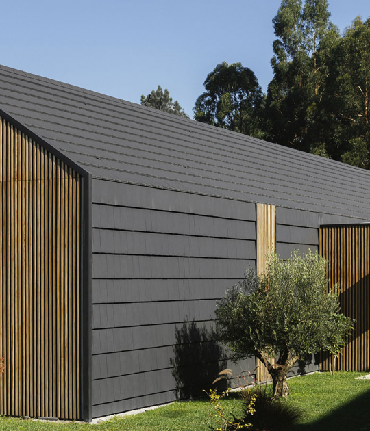Santo Tirso House by Hous3. Photograph by Ivo Tavares Studio