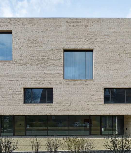 Access façade of building along the city promenade. City Library in Heidenheim by Max Dudler. Photograph by Stefan Müller